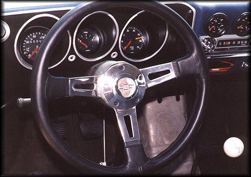 Instrument cluster, steering wheel, shifter